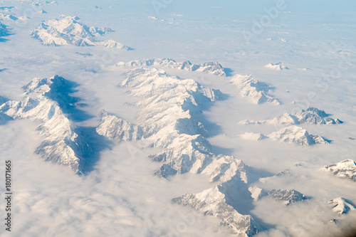 Wallpaper Mural aerial view of snowy alps range, during winter season Torontodigital.ca