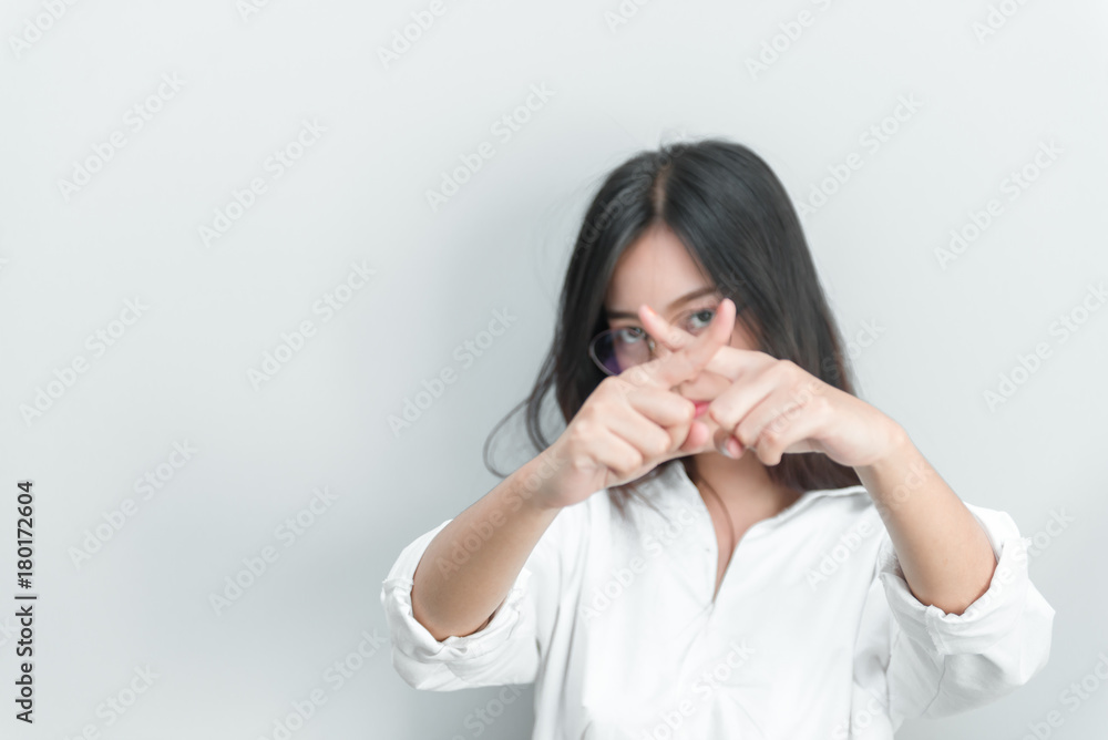 Asian woman make hand stop on white background Asian woman make hand stop on white background