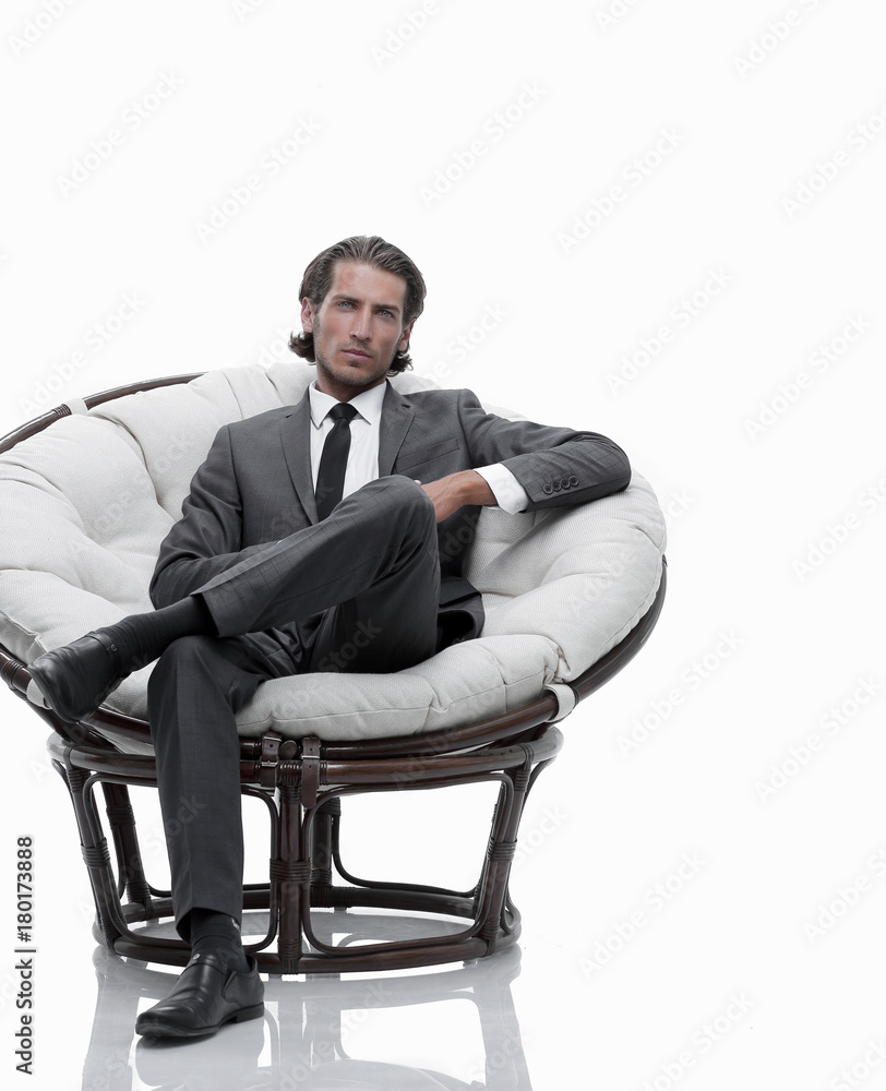 successful businessman sitting in chair. successful businessman sitting in chair.