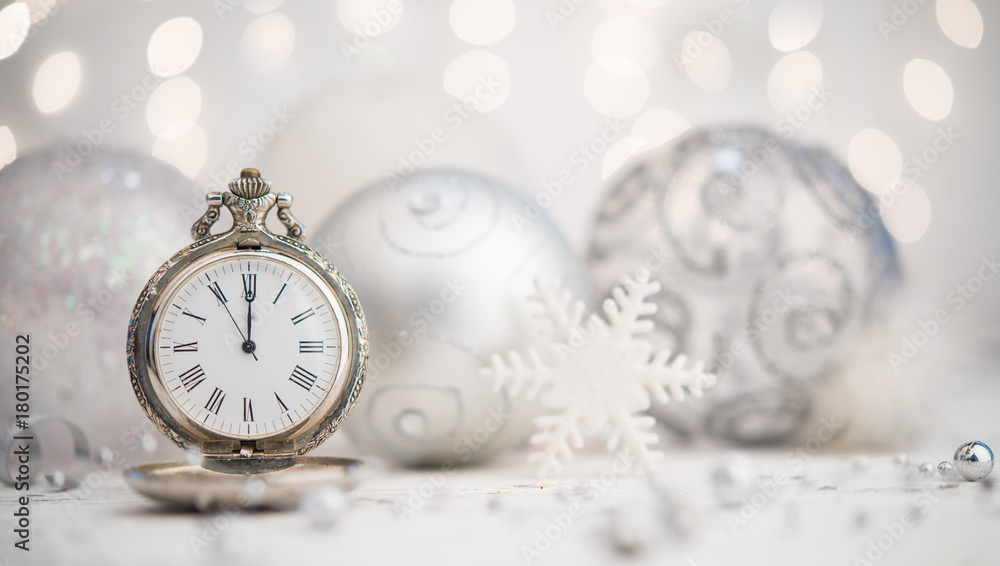 Siler christmas ornaments and pocket watch shows new year