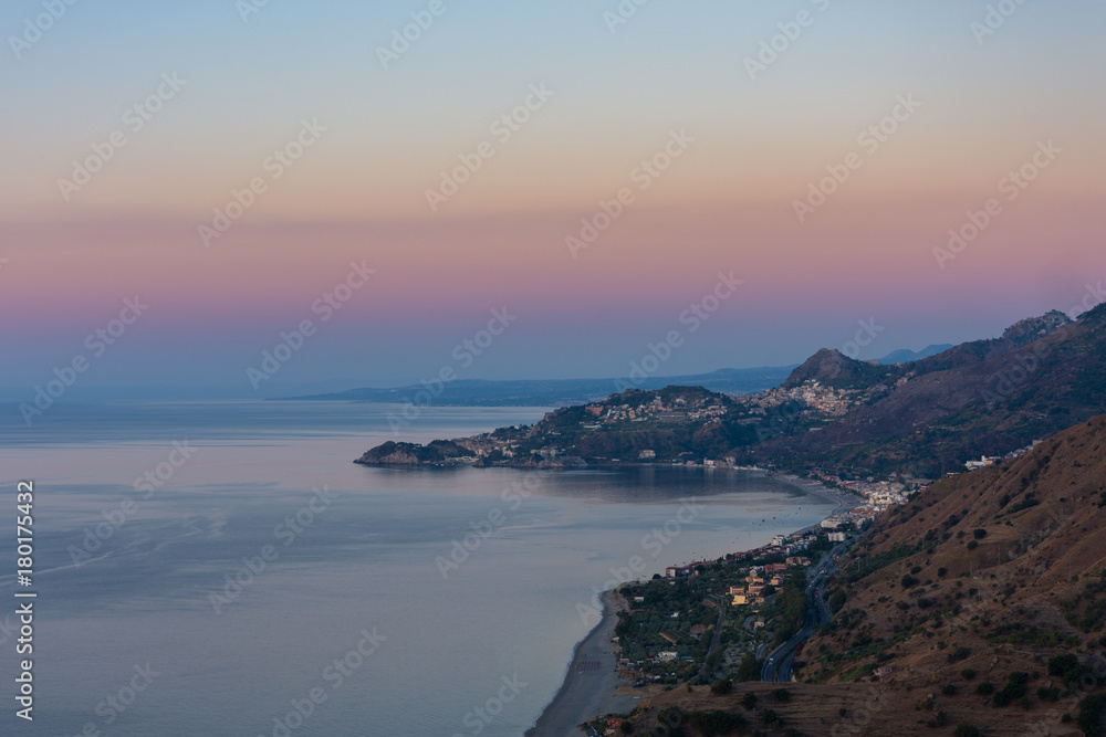 Taormina Bay at dawn seen from Forza D'Agrò