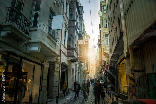 Old city street at sunset in the evening