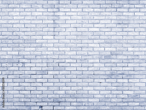 pale blue old brick wall with repeating pattern