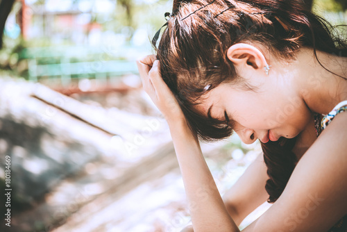 Close up sad beautiful asian woman from unrequire love,she think so much about boyfriend,life without love photo