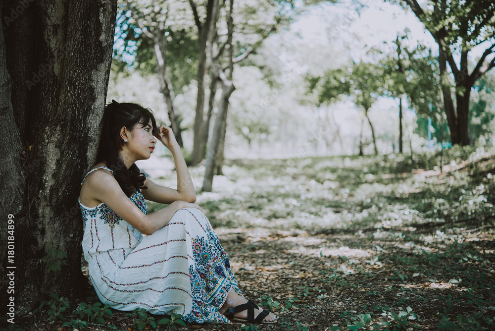 Naklejka premium Close up sad beautiful asian woman from unrequire love,she think so much about boyfriend,life without love