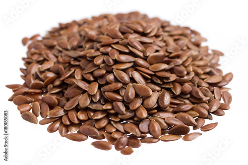 Brown Flax. Pile of grains, isolated white background.