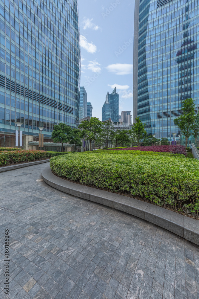 empty pavement and modern buildings in shanghai empty pavement and modern buildings in shanghai