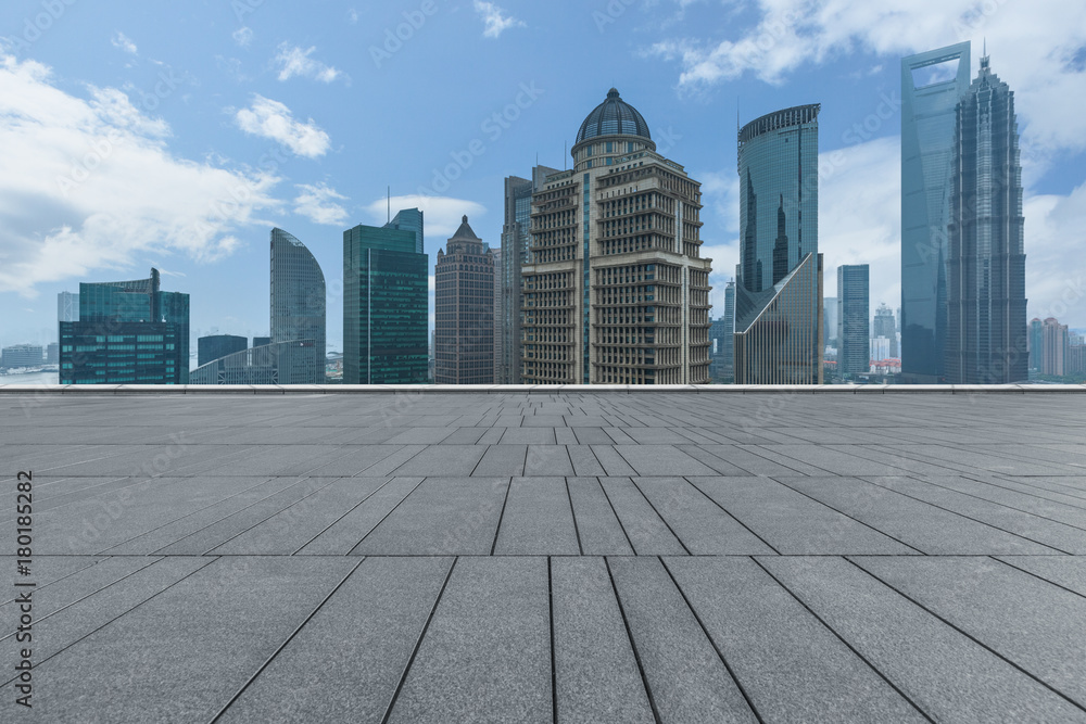 Empty brick floor with modern building in Shanghai. Empty brick floor with modern building in Shanghai.
