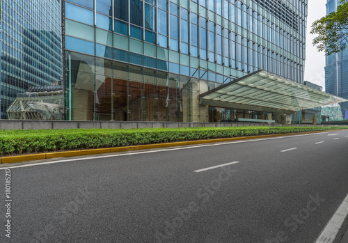 empty asphalt road front of modern buildings.