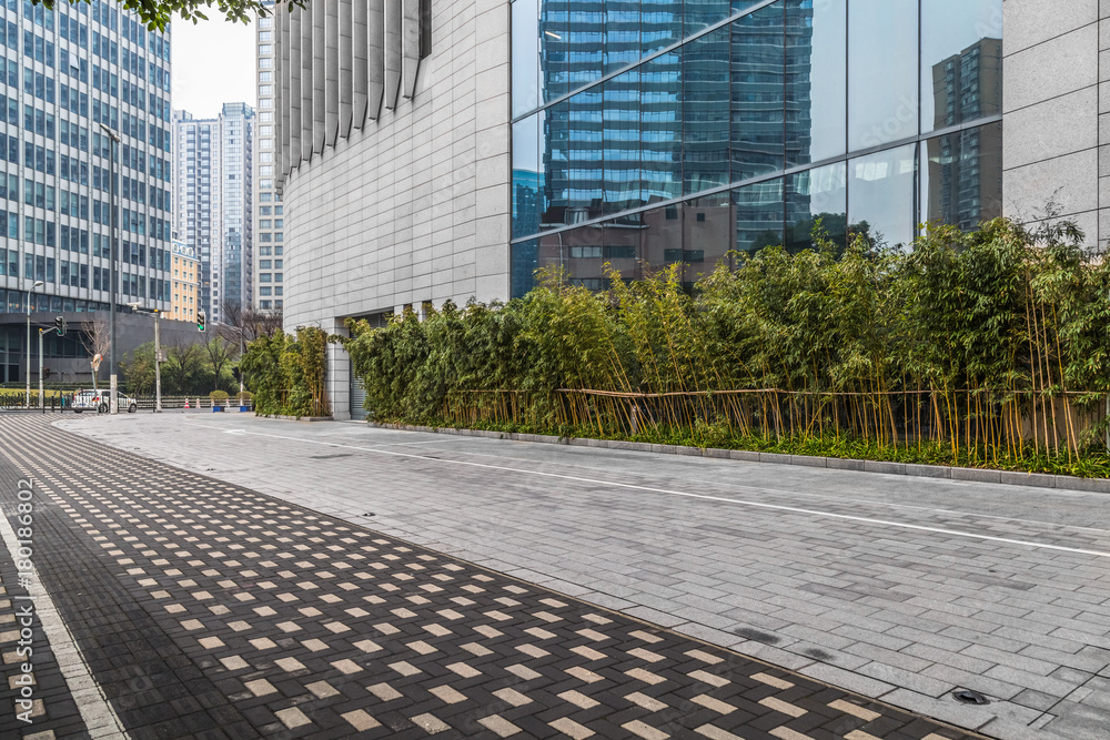 Fototapeta premium modern buildings and empty pavement in china..