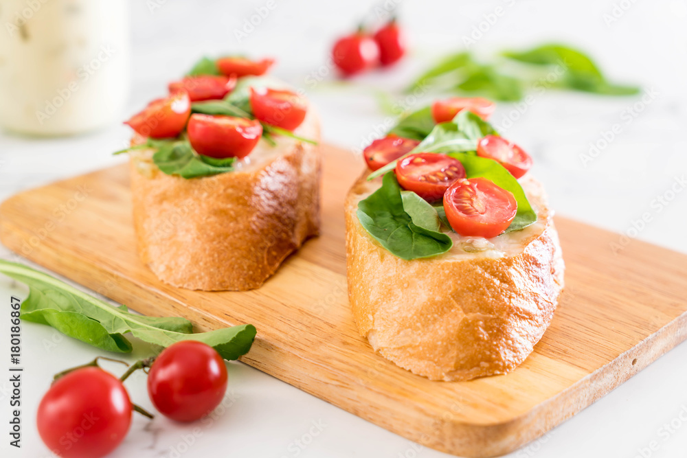 bread with rocket and tomatoes bread with rocket and tomatoes