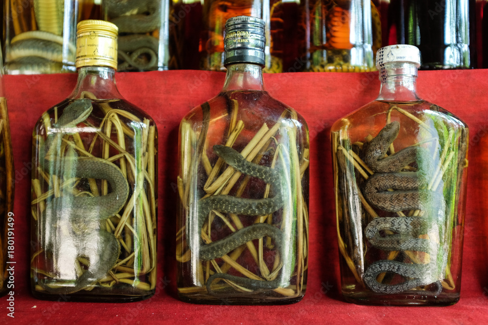 Local Traditional Ferment Whiskey at a a Whiskey Village, Ban Xang Ha, Luang  Prabang, Laos. Photos | Adobe Stock