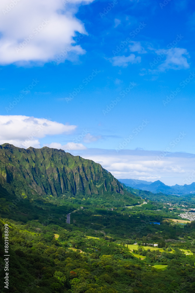 View of the winward side of Oahu from the Pali lookout in nuuanu (Nu'uanu) Hawaii. Nuuanu pali lookout is a viewing stand in the northeastern part of Oahu, Hawaii, USA