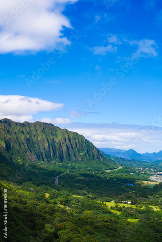 View of the winward side of Oahu from the Pali lookout in nuuanu (Nu'uanu) Hawaii. Nuuanu pali lookout is a viewing stand in the northeastern part of Oahu, Hawaii, USA photo