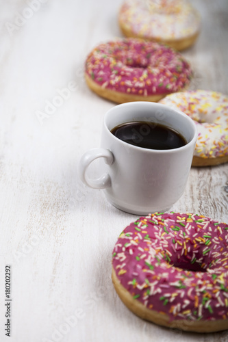 Donuts and a cup of coffee close-up