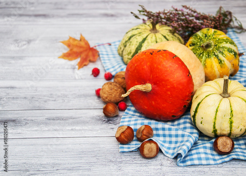 Pumpkins with autumn leaves