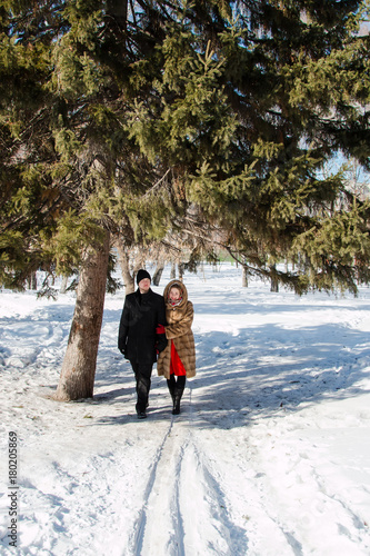 Couple on winter in forest