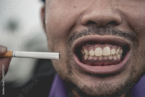 Cigarette with mouth,no world tobacco day,selective focus