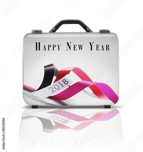 Business suitcase for travel with reflection and 2018 wishes photo