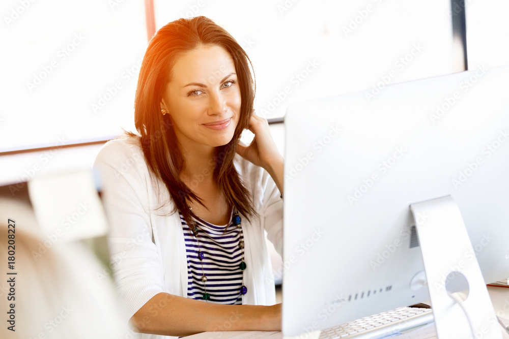 Happy entrepreneur or freelancer in an office or home Happy entrepreneur or freelancer in an office or home
