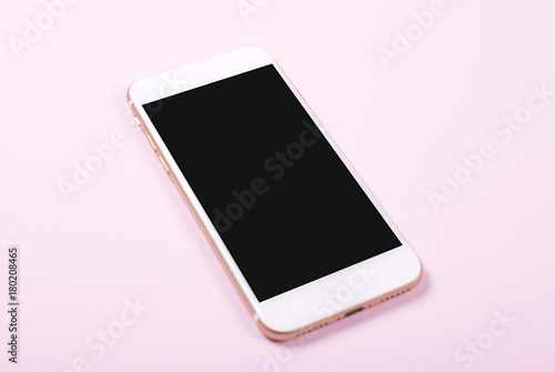 Smartphone on pink background. Technology