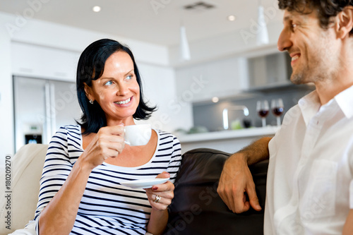 Portrait of a couple having tea at home