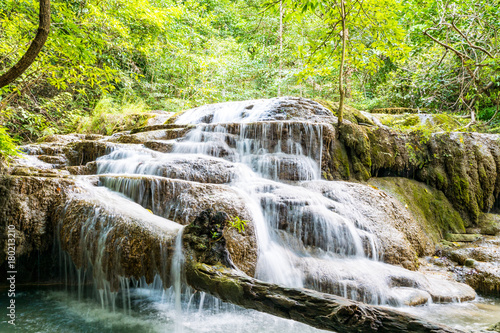 Fototapeta Naklejka Na Ścianę i Meble -  Beautiful tropical waterfall in forest, Erawan waterfall