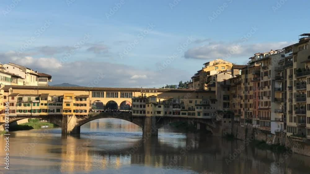 FLORENCE - OCTOBER 2016: Panoramic view of Lungarni. The city attracts 5 million tourists annually. FLORENCE - OCTOBER 2016: Panoramic view of Lungarni. The city attracts 5 million tourists annually.