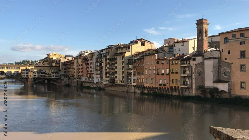 FLORENCE - OCTOBER 2016: Panoramic view of Lungarni. The city attracts 5 million tourists annually. FLORENCE - OCTOBER 2016: Panoramic view of Lungarni. The city attracts 5 million tourists annually.