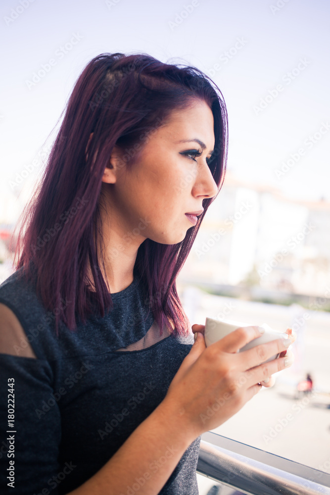 Beautiful girl drinking coffee at the coffee shop Beautiful girl drinking coffee at the coffee shop