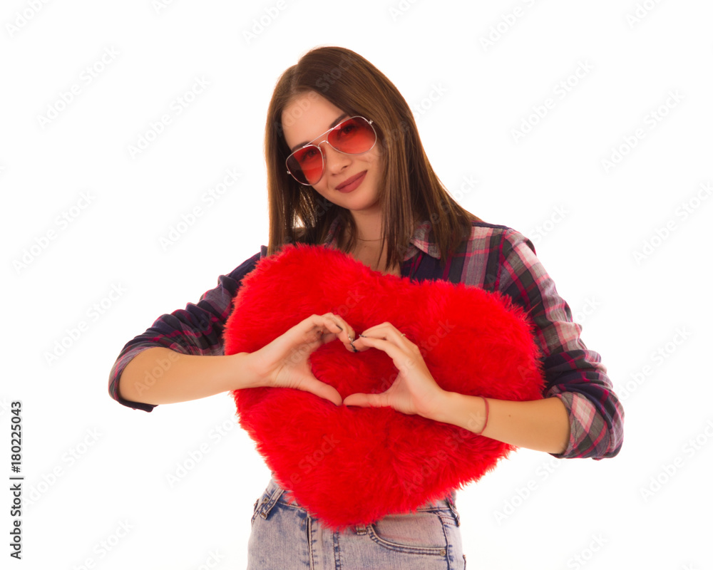 Young cute girl with heart, isolated Young cute girl with heart, isolated
