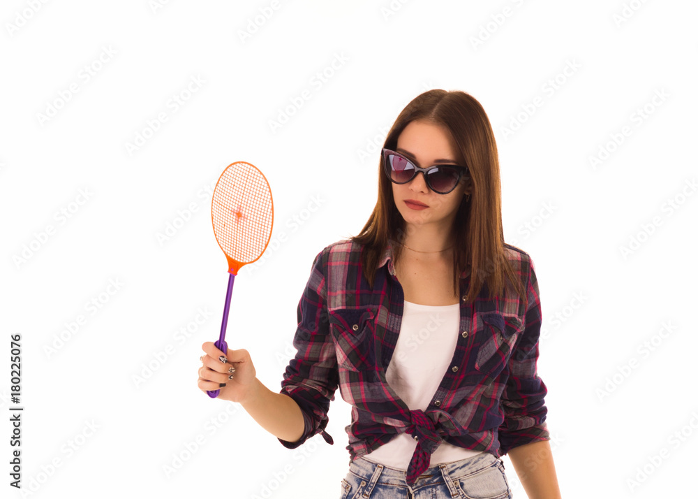 Young cute woman with fly swatter, isolated Young cute woman with fly swatter, isolated