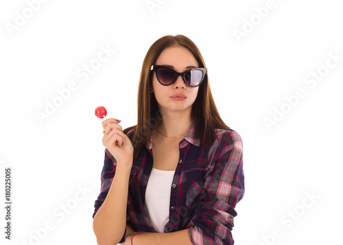 Young cute girl with lollipop, isolated  