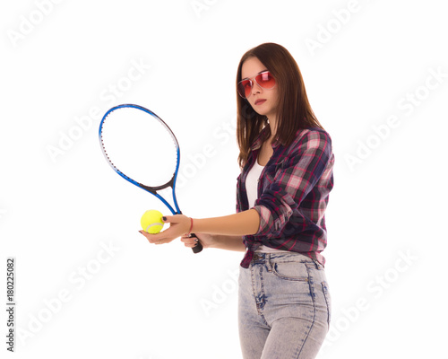 Young cute girl with tennis racket, isolated 