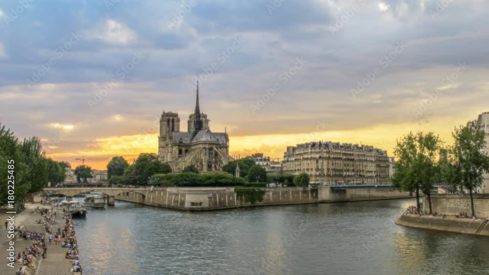 Notre Dame cathedral in Paris, France, against sunset sky. Scenic view over la Cite with fast moving dramatic clouds. 4K timelapse. Notre Dame cathedral in Paris, France, against sunset sky. Scenic view over la Cite with fast moving dramatic clouds. 4K timelapse.
