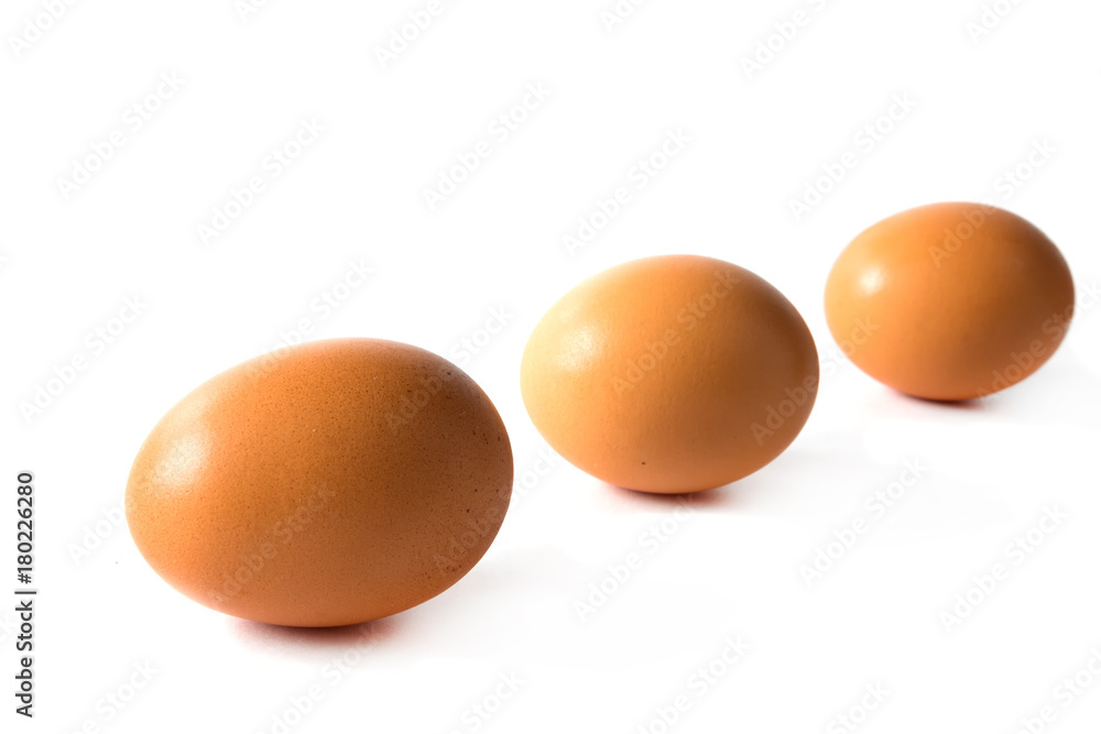 Chicken eggs brown close-up on white background isolate Chicken eggs brown close-up on white background isolate