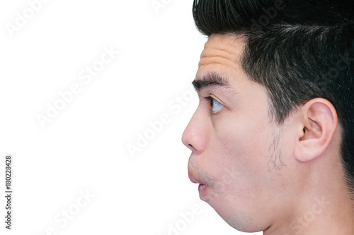 Close-up beside face handsome excited young isolated on white background. Human Face. Asia man people.