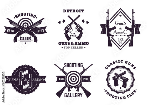 guns and ammo, vintage logos, badges with automatic rifles, crossed revolvers, pistols, shooting gallery logo with assault rifles and shotguns on white