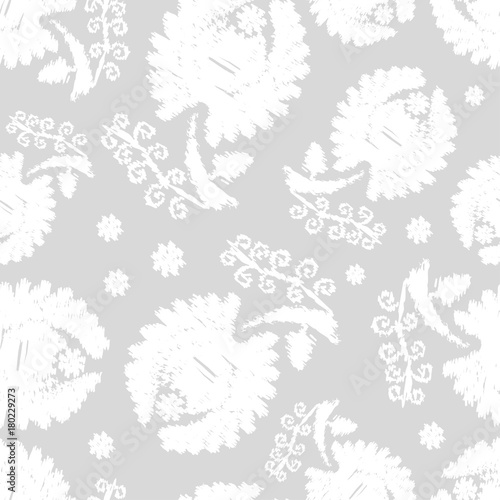 White flowers on a gray background. Embroidery texture. White Texture. Seamless vector background.