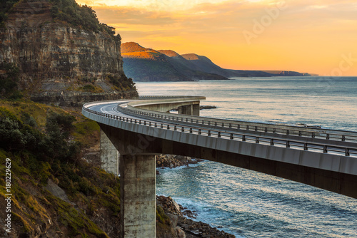 Photography Sunset over the Sea cliff bridge along Australian Pacific ocean