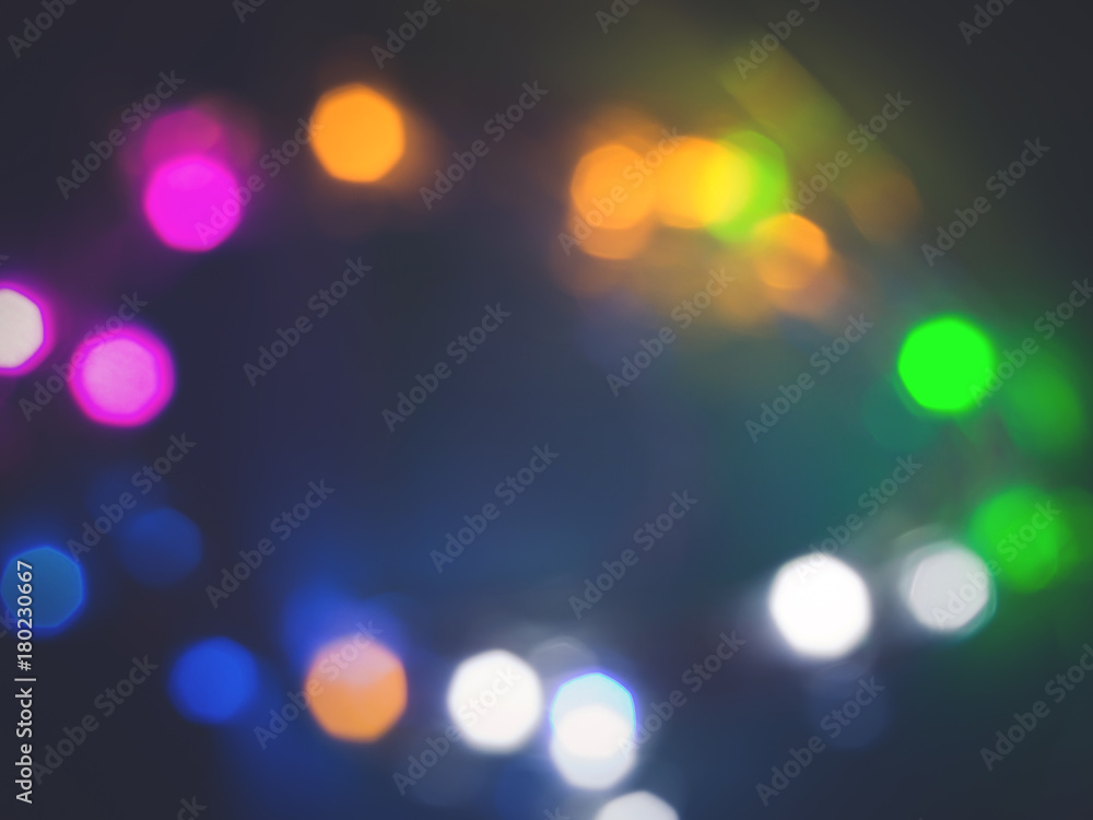 Unfocused Colorful festive lights abstract background. Christmas Valentine day greeting card Unfocused Colorful festive lights abstract background. Christmas Valentine day greeting card