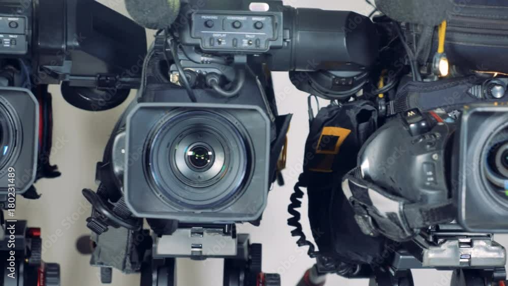 A close moving shot on large video cameras. A close moving shot on large video cameras.