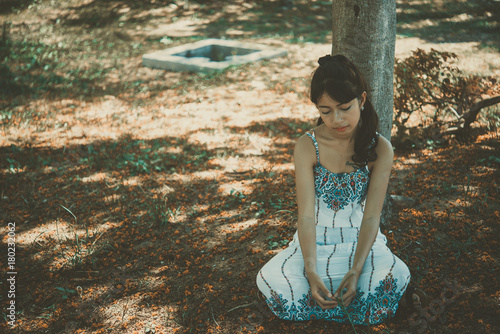 Close up sad beautiful asian woman from unrequire love,she think so much about boyfriend,life without love photo