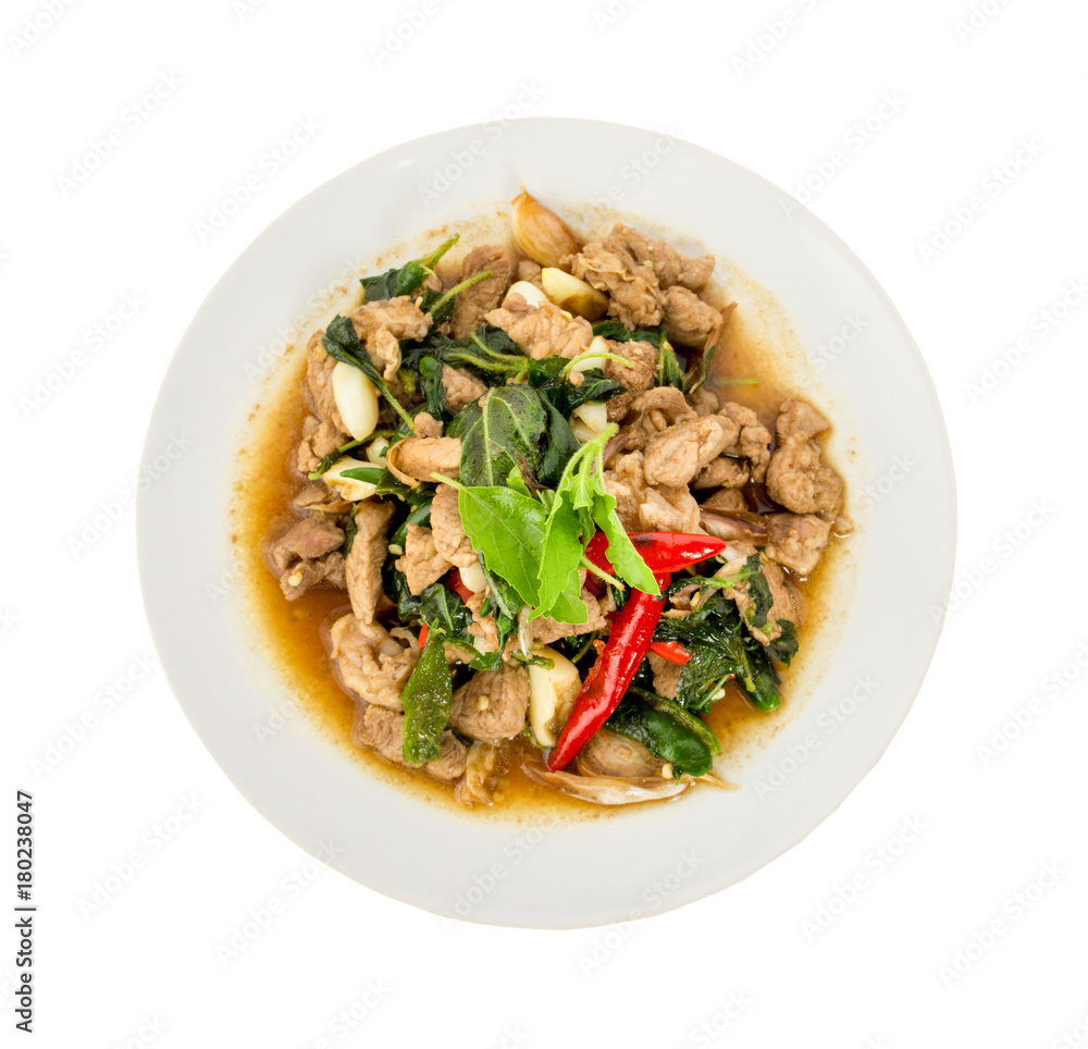 .Stir fried pork and basil top view on white background .Stir fried pork and basil top view on white background