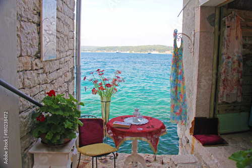 ROVINJ, ISTRIA PENINSULA, CROATIA, 30 June 2013: Beautiful romantic old town of Rovinj. View of charming narrow stone Streets with colorful shops.