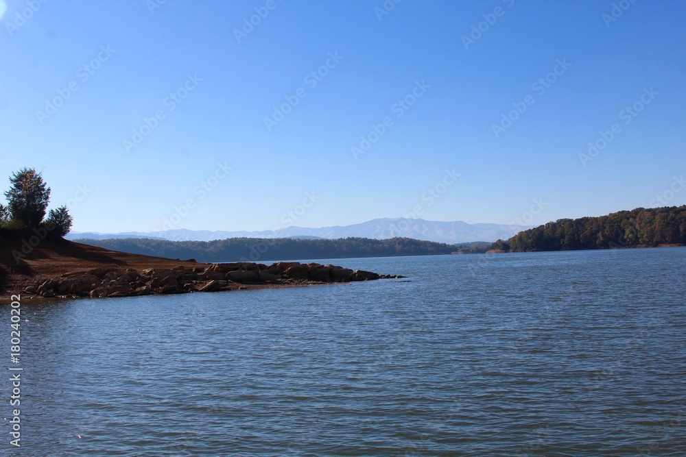 A beautiful morning at the lake with the mountain ranges in the background.