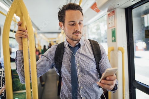 Businessman Commuting By Tram In Melbourne