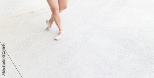 ballet right foot stand and left foot point position on the street with point shoes
