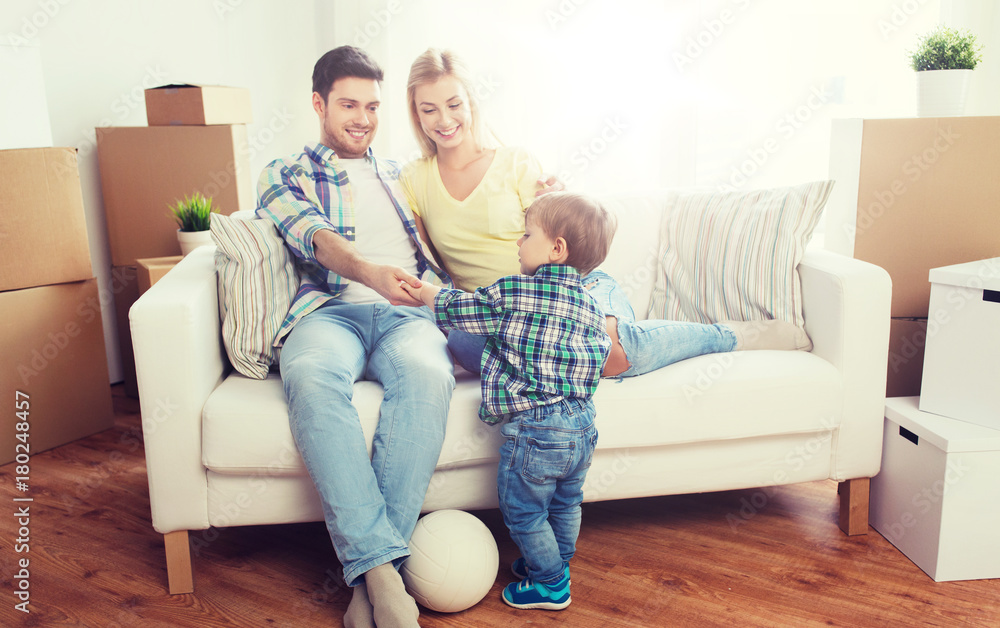 happy family moving to new home and playing ball happy family moving to new home and playing ball