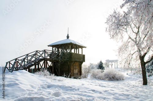 A watchtower wooden tower in winter, when there is a lot of snow. Poltava, Ukraine © Oksana